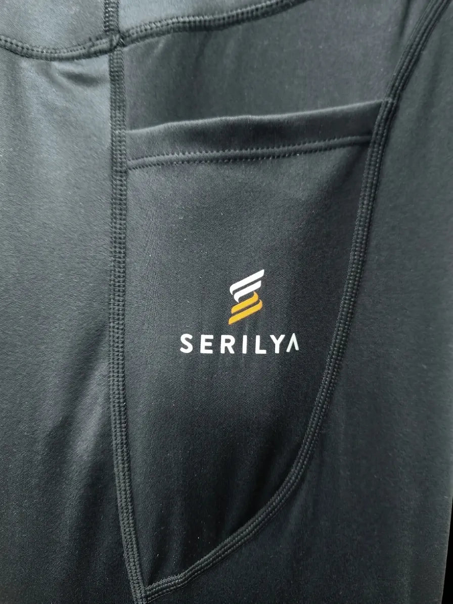 SERILYA® Logo auf schwarzen Leggings mit Seitentasche, High-Waist Design